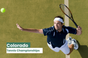 tennis player that has thrown a tennis ball in the air getting ready to hit it for the Colorado Tennis Championships